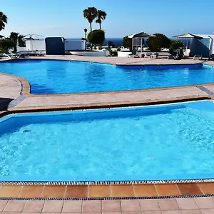 https://puerto-del-carmen-center-new-apartment-by-the-pool-and.puertodelcarmen-hotels.org